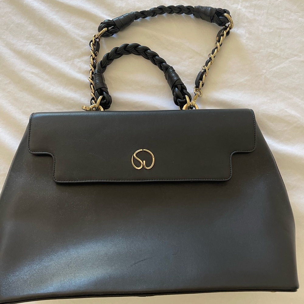 Brand new St. John very elegant hand bag purse